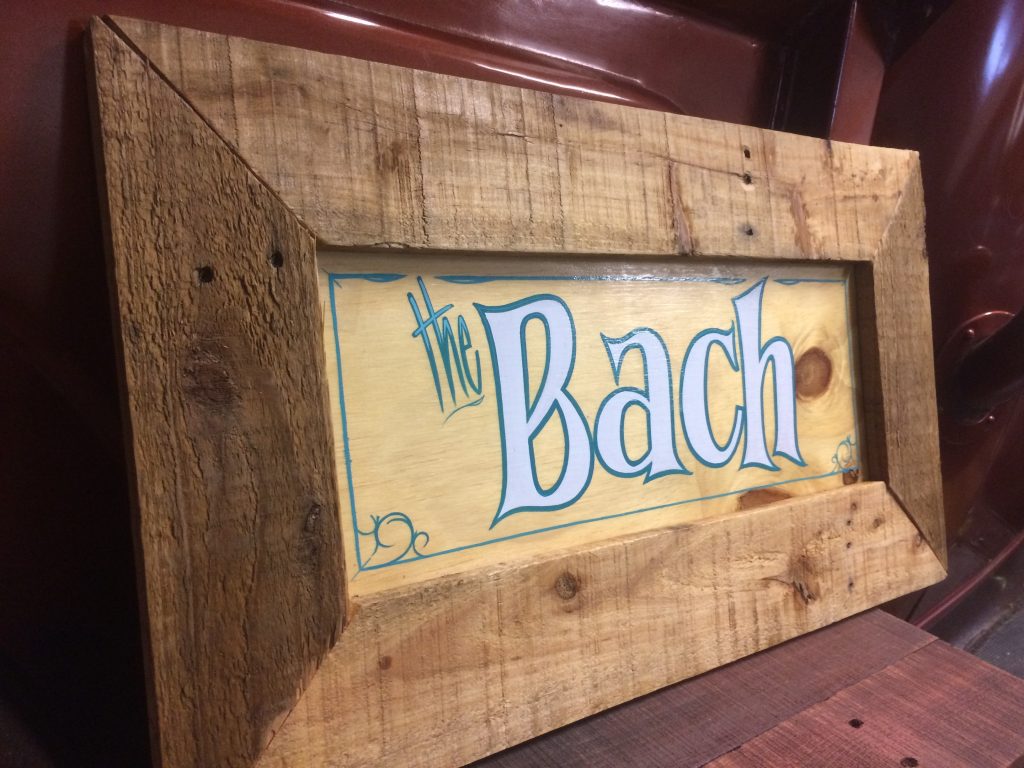 New Zealand Bach sign hand lettered and painted